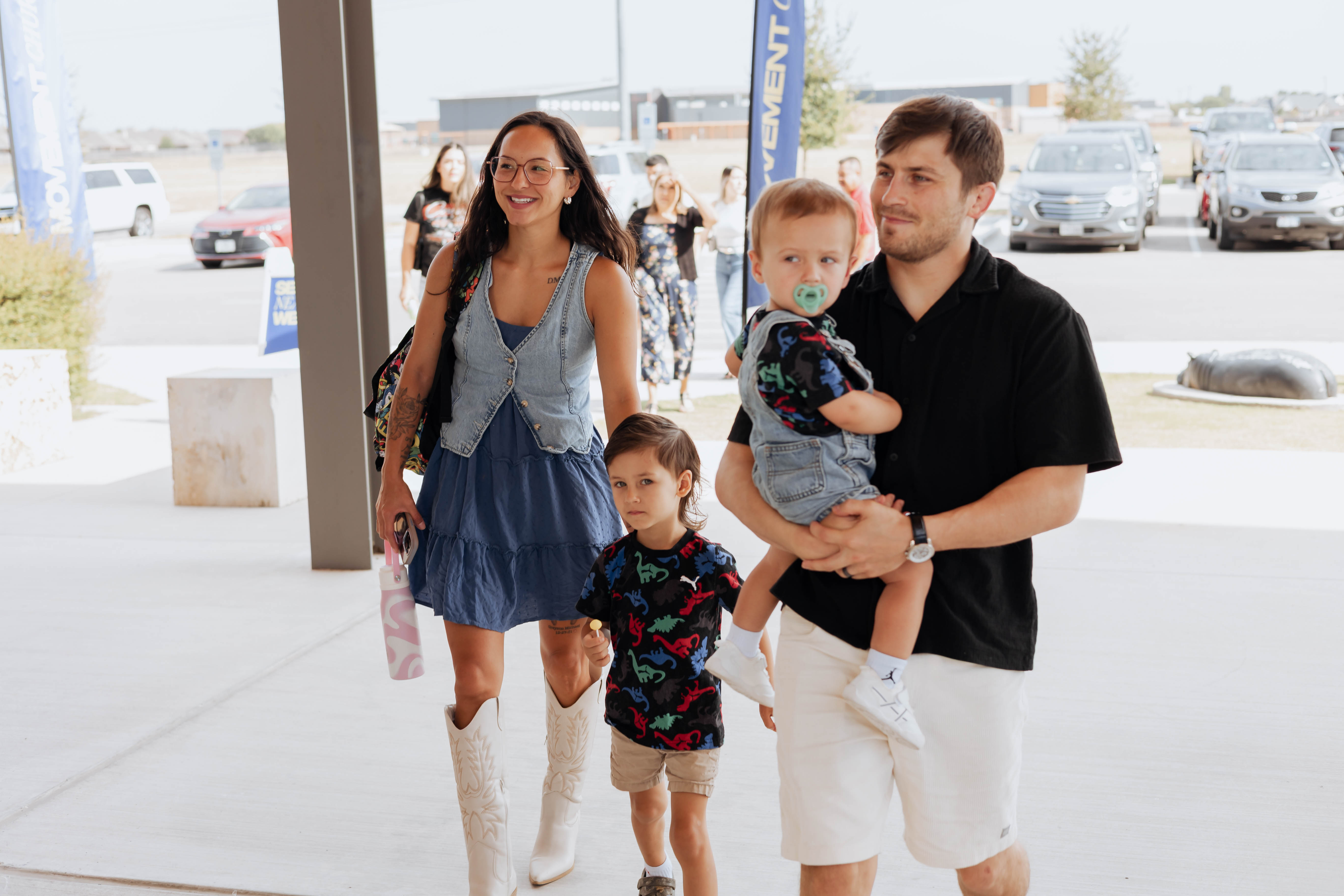 A young family arriving at Movement Church on a Sunday morning