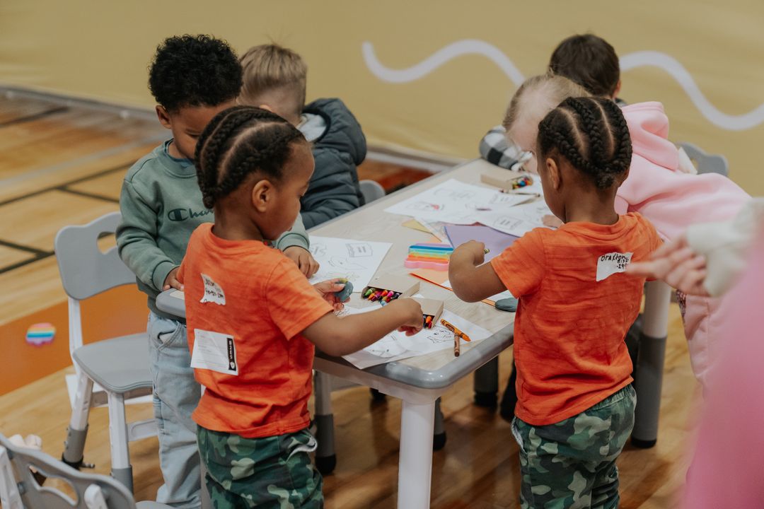 Kids doing crafts in Movement Kids