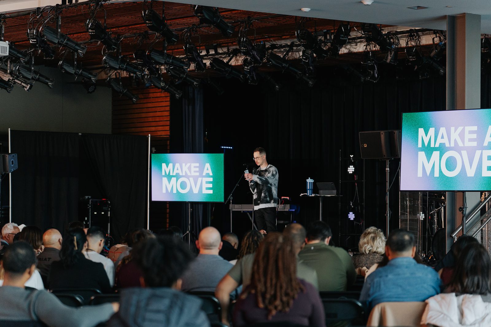 Pastor Brandon preaching at Movement Church